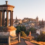 Edinburgh's Calton Hill with city in the background on a sunny morning