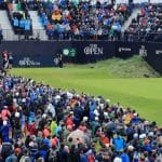 Tee box at The 148th Open with record crowds looking on