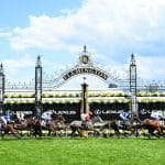Melbourne Cup Carnival 2024 - View of horses crossing the Winning Post