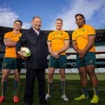 Eddie Jones and Wallabies posing on the pitch