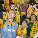 Young Wallabies fans getting a selfie with Tate McDermott
